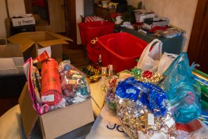 Boxes full of holiday gift wrapping supplies.